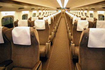 Train travel in Japan: Comfortable 'green car' seats on a Series N700 Shinkansen train