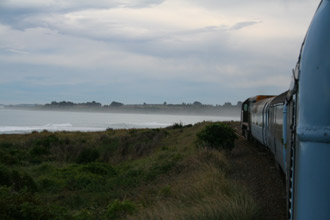 Misty Pacific coastline seen from the Tranz Coastal train