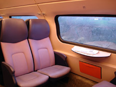 ...on the top deck of a double-deck InterCity train to Amsterdam...