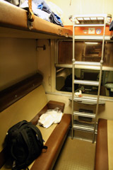 Couchette compartment on the Snow Train, in evening mode with seats set up.