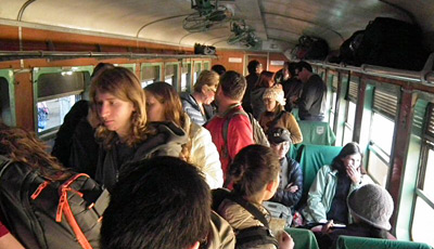 Westerners boarding the upper class car of the train to Lashio