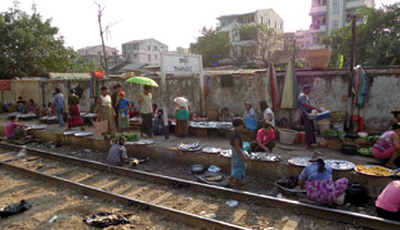 Market traders by the tracks of the Yangon Circle Train