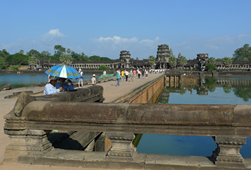 Crossing the moat to Angkor Wat