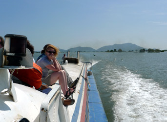 Sitting on deck on the speedboat to Siem Reap