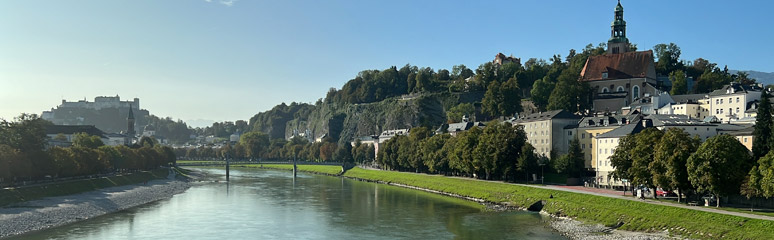 View of Salzburg as the train crosses the River Salzach