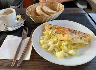 Breakfast in the bristro when travelling Zurich to Prague
