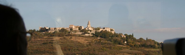 Hilltop village in the Rhone Valley seen from the Paris to Barcelona train