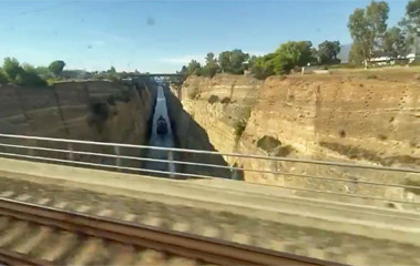 The train crosses the Corinth Canal