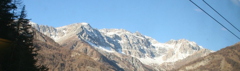 Moresnow-capped mountains from the TGV train to Italy