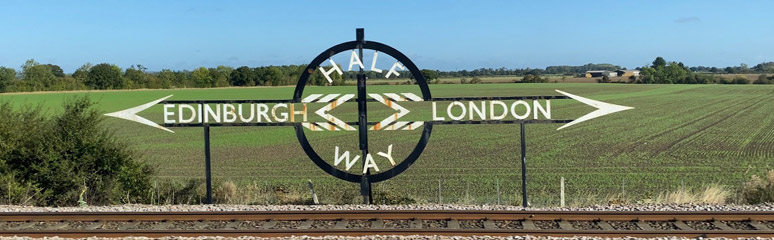 The Half Way from London to Edinburgh sign