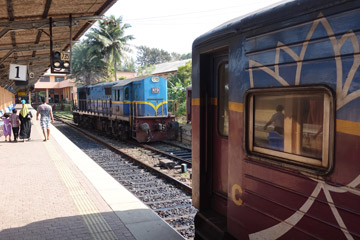 Locomotive runs round its train at Galle