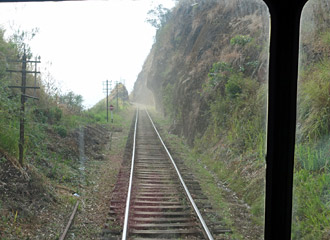 The railway hugs the hillside