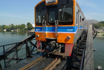 The weekend excusion railcar crosses the Bridge on the River Kwai