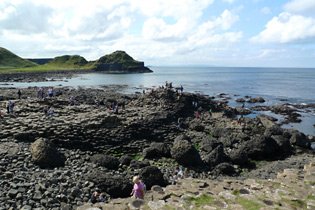 The Giant's Causeway in Northern Ireland.  Travel there by train & ferry, no flight required!