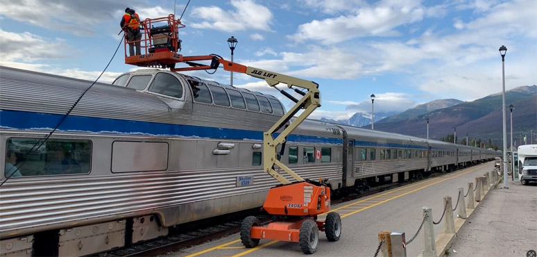 The train's dome windows are cleaned at Jasper