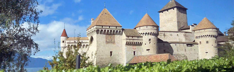 Chillon castle, seen from a Miloan-Geneva train