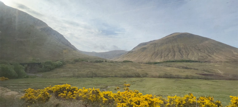 The sleeper to Fort William about to go around the horseshoe curve