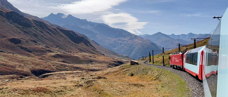 The Glacier Express descends from the Oberalp Pass