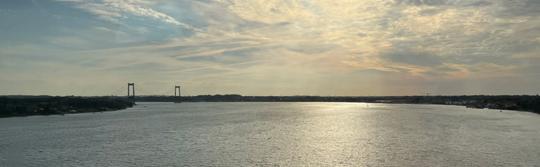 Hamburg to Copenhagen train approaches the Great Belt fixed link