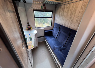 Sleeper on Italian Intercity Notte train in daytime seats mode