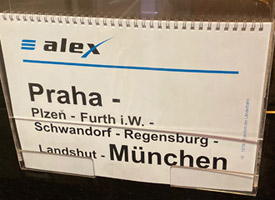 Munich to Prague train destination board