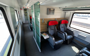 Business class on a railjet train, showing aisle