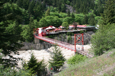 Rocky Mountaineer passes Hell's Gate on the Fraser River