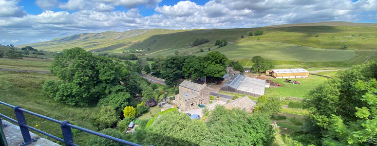 A farm seen from the Settle and Carlisle railway