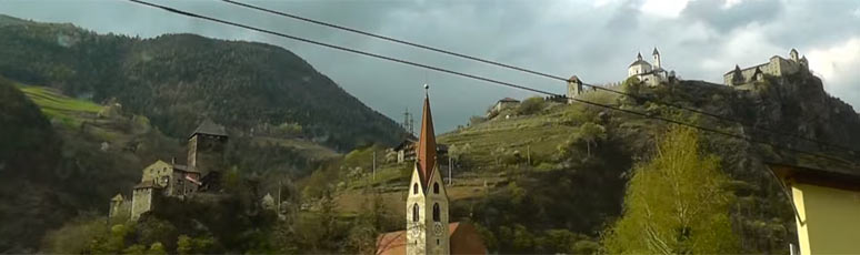 Hilltop fortresses seen from the Brenner Pass train