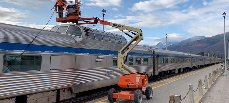 The train's dome windows are cleaned at Jasper