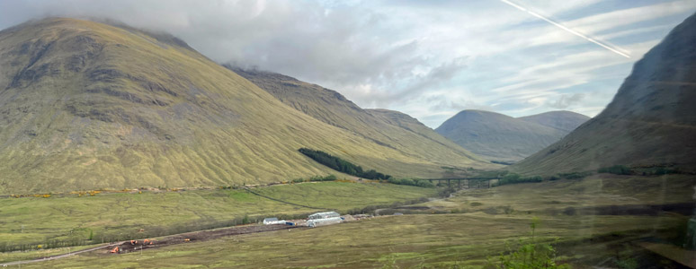 The sleeper to Fort William about to go around the horseshoe curve