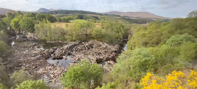 The sleeper train runs along the River Spean