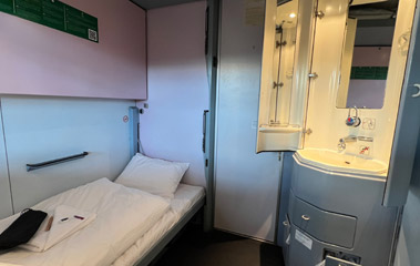 Sleeper looking towards corridor