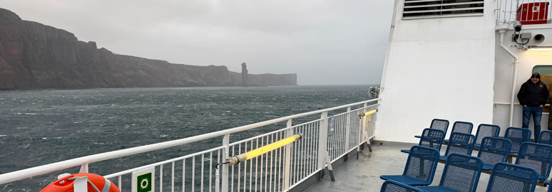 The ferry passes the Old Man of Hoy